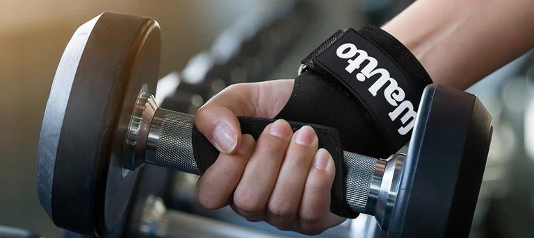 Close view of the wrist fastening and hand around a weight handle