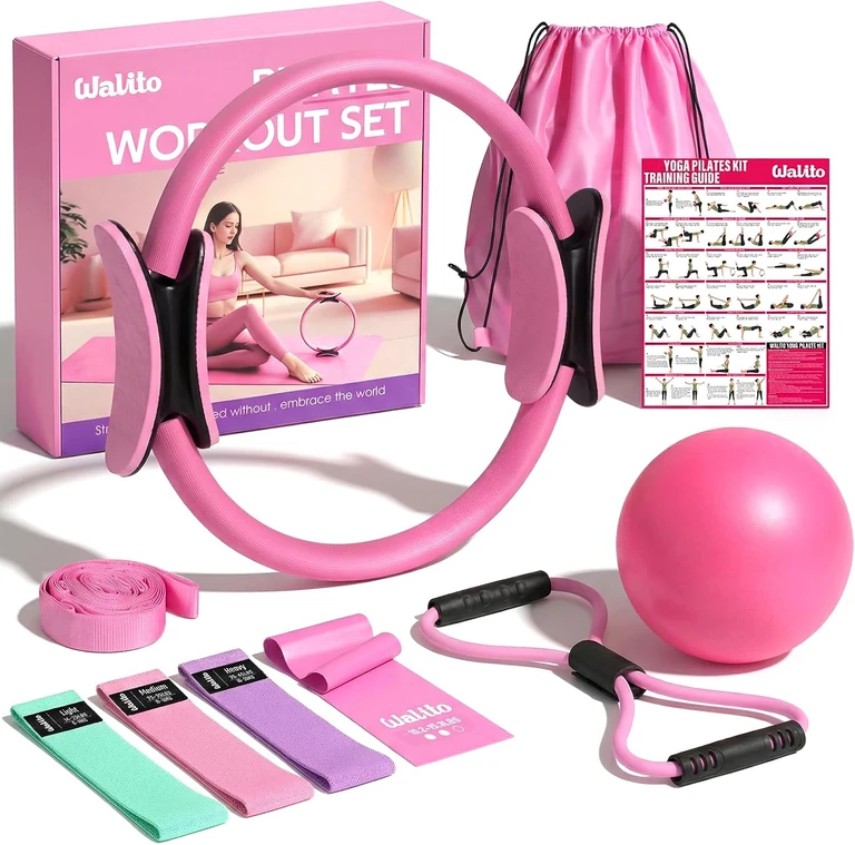 Pink Pilates ring kit with mini ball, fabric loops, flat band, figure-eight band and strap